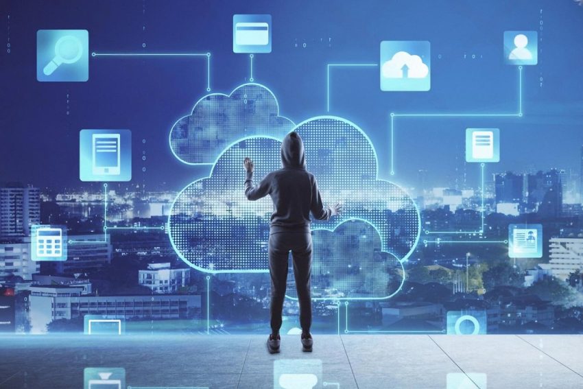 Person interacting with a cloud computing network above a UAE city skyline